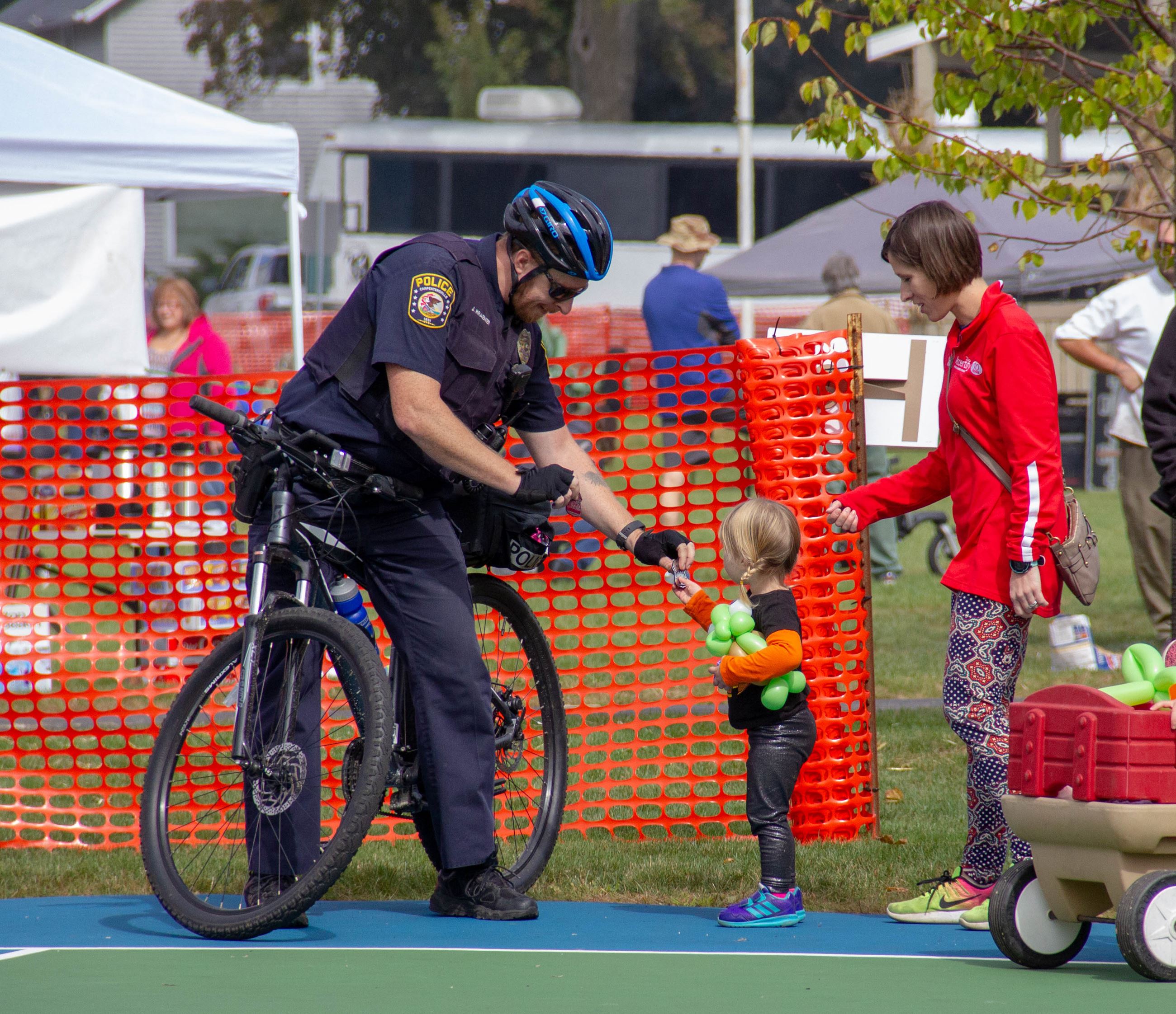Bike Patrol Officer with Child
